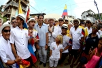 ISA President Fernando Aguerre with local team Ecuador. Credit: ISA / Michael Tweddle 