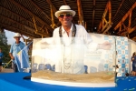 ISA President Fernando Aguerre with the Sands of the Worlds. Credit: ISA / Rommel Gonzales