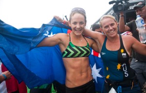 Australia’s Jordan Mercer and Angela Jackson celebrate after winning the Women’s Paddleboard Race and SUP Race respectively. Photo: ISA/Rommel